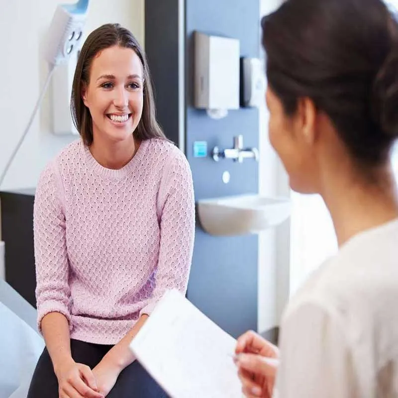 Nurse practitioner with a patient at an in clinic appointment